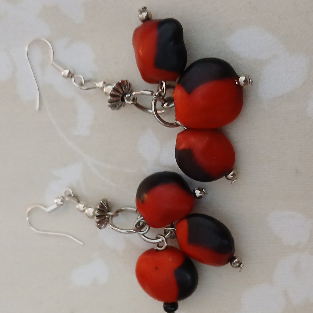 Huayruro earrings. NWOT.